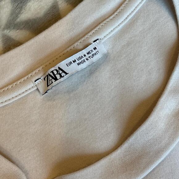 Brown corduroy trousers and cream t-shirt - Picture 5 of 7